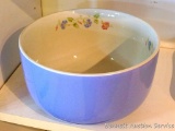 Pretty blue Hall's China mixing bowl has Morning Glories design inside. Bowl is in very good