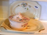 Antique floral serving platters and covered dish. Largest platter is 11-1/2