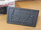New in package NorPro cast iron bacon grill/press.