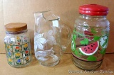 Summery drink dispenser, pretty pitcher and a flowered glass canister. All in good shape.