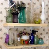 Assorted sizes and shapes of vases; tallest vase measures 3