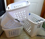 Three 1.5 bushel Sterilite laundry baskets, larger stackable Sterilite laundry basket with wheels;