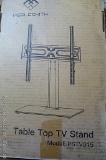 New in package Perlesmith table top TV stand with instruction manual. Model PSTVS15.