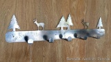 Northwoods wall hanging coat rack is 3' wide.