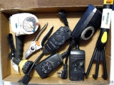 Garden tools including timers, sprayer, pruners, fork.