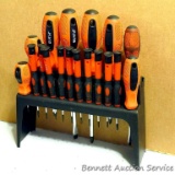 Wall mountable rack with a set of assorted screwdrivers. Unit measures approx. 9