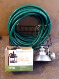 50' garden hose; window basket and two light fixtures. Wire basket is 16
