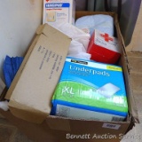 Several pkgs. Of Underpads size XL; a few adult diapers; several rolls of ace wrap; roll of 10