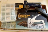 Swingline staple gun comes with storage box, staples; plus two organizers with fasteners.