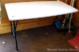 New style plastic folding table is sturdy and in good condition. Measures 4' x 2' x 27
