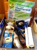 Household handyman items including window insulation kit, weather strip kit, electrical tape,