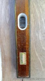 4' American level is No. LJ860911 48 is in good shape with brass edges. Windows and vials are good.
