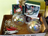 Two large iridescent glass ornaments are each 5-1/2
