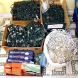Quantity of Christmas lights, some new in package. We tested the top layers of lights and they work.