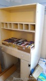 Wooden desk with large drawer under table, 2 side storage areas below, sectioned storage shelf