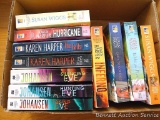 Books by authors Karen Harper, Iris Johansen, Susan Wiggs.