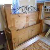 Large wooden bed headboard, footboard and supporting pieces for a full size bed. Headboard measures
