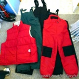 Two pair girl's snow pants, size 14; black snow pants child's XL; men's reversible vest is size XL.