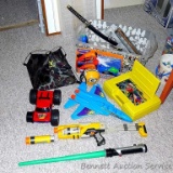 Tub of toys includes some K'Nex; Nerf rifle; set of 4 water Blasters; ceramic military dressed piggy