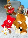Sterilite 73 qt. tote filled with stuffed toys. Largest teddy bear is 23