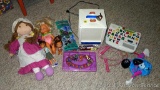 Lite-Brite Cube lights up; butterfly kite; Wonder Tubes; beads; dolls and more.