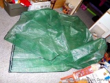 Plastic reinforced dome that measures 4' x 6' x 8' tall. Could be used as a gardening hot house or a