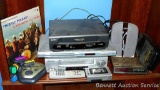 Emerson VHS player, Phillips DVD player, Samron VHS player, VHS rewinder, Sanyo personal cassette