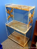 Metal shelf unit with 3 shelves; measures 21-1/2