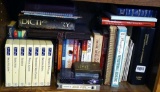 Shelf of books with a variety of subjects including health and healing, Jenny Craig including VHS's,