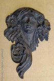 Cast metal wall hanging; measures 8
