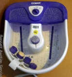 Conair foot bath includes 5 different scrubbing/massaging attachments; measures 17