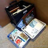 Grand Pack-N-Roll portable cart filled with picture frames and nature photos; cart opened up