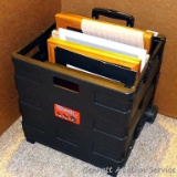 Grand Pack-N-Roll portable cart filled with picture frames; cart opened up measures 15