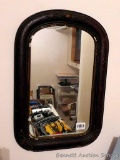 Antique framed mirror measures approx. 1-1/2' x 2'.