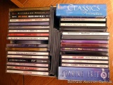 CDs including Marty Stuart, Dolly Parton, Wynonna Judd, Alabama, more, plus computer games and