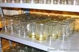 Thirty nine Kerr narrow mouth pint canning jars.