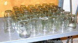 Thirty seven Kerr narrow mouth pint canning jars and one other.