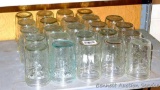 Twenty four Ball wide mouth pint canning jars.