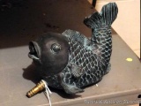 Resin fish for a water fountain or similar is 5