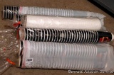 Lots of Nescafe paper coffee cups and lids