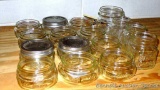 One dozen Ball wide mouth jelly jars; 3 Atlas narrow mouth half pint jars; one Ball Special wide