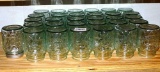Thirty one Better Homes and Gardens pint canning jars.