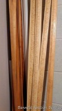 Wood and plastic trim and corner sections, most are 8 ft. long.