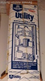 Hom-E-Quip adjustable steel shelving. Has 4 shelves and is 12