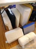 Variety of wedge and shaped pillows for comfort while sleeping. Largest is 22