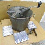 Antique Majestic Breadmaker No. 80 with clamp and hook; plus three aluminum corn bread stick pans,