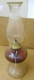 Nice footed glass oil lamp is 18
