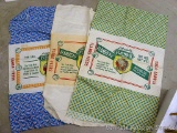 Three vintage feed sacks all from Flambeau Milling Company, Phillips, Wis and Flam-bo Feeds.