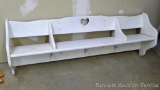 4' wide display shelf with pegs. This would work well in an entry way.