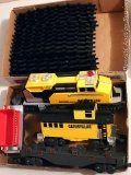 Caterpillar toy train set comes with track, engine, caboose and two other cars. Track pieces are